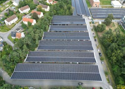 Aerial view of Bion XL solar parking canopies at Baxter Halle, Germany