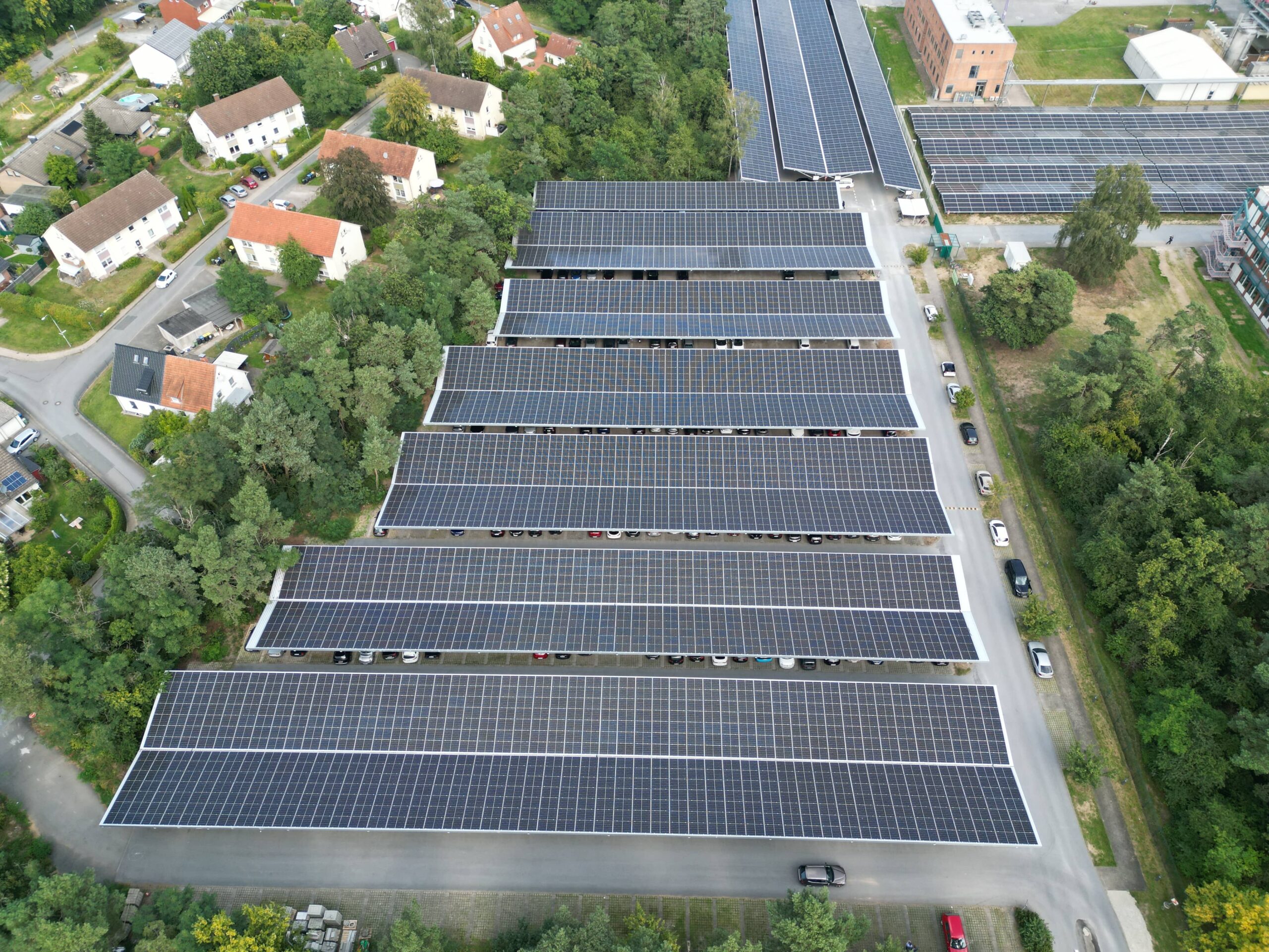 Aerial view of Bion XL solar parking canopies at Baxter Halle, Germany