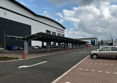 Covered commercial parking with OPTI Bluetop Solar Parking at Panattoni Park