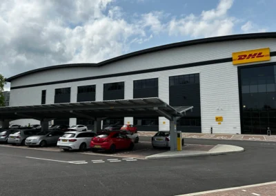 Covered car parking with OPTI Bluetop Solar Parking solar canopies