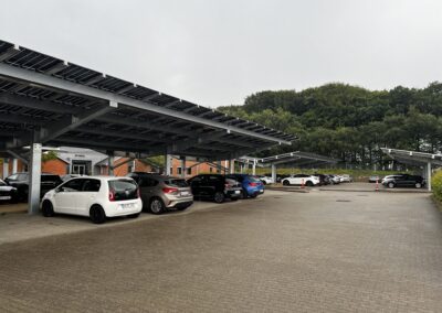 Solar-powered parking canopies by Bluetop Solar Parking in Skanderborg