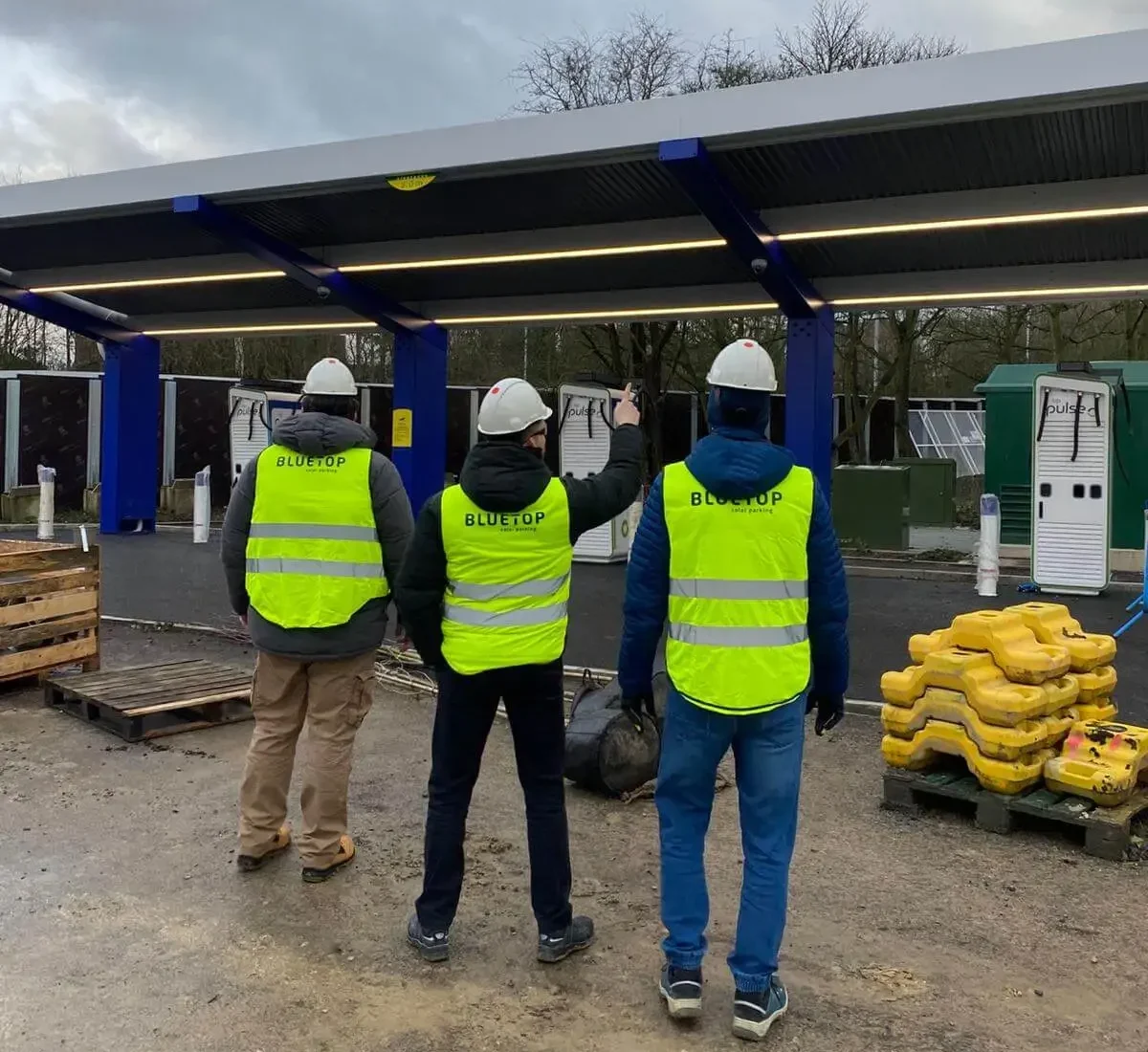 Bluetop employees inspecting building site